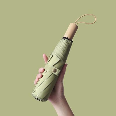 Enkelt enfärgat vindtätt retro herr- och damparaply med trefaldig vikning, fast paraplyparaply