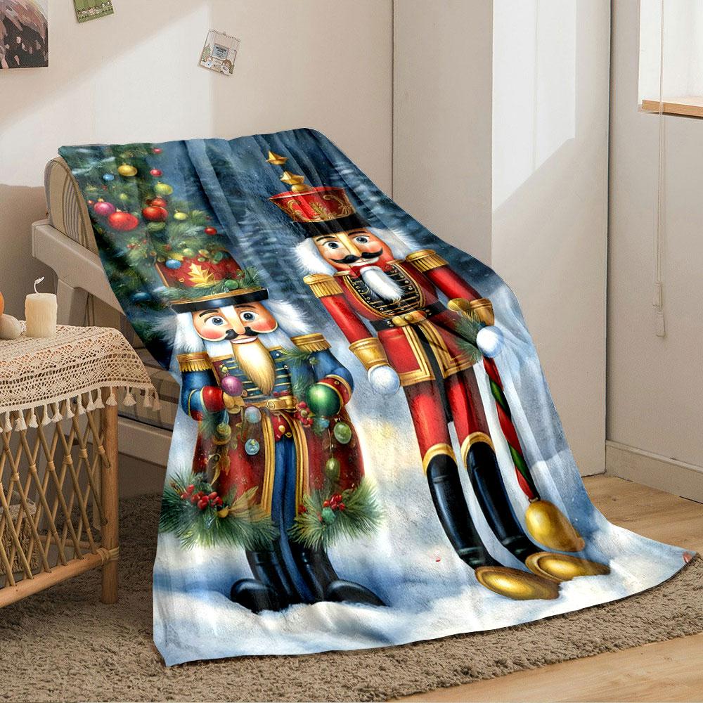 Two Festive Nutcracker Figures, One In Red and One In Blue, In Snowy Scenery. for All Seasons Blanket Lunch Break Throw Gift