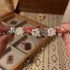 Guochao new Chinese lotus bracelet high value temperament send girlfriend exquisite design color braided rope national style jewelry