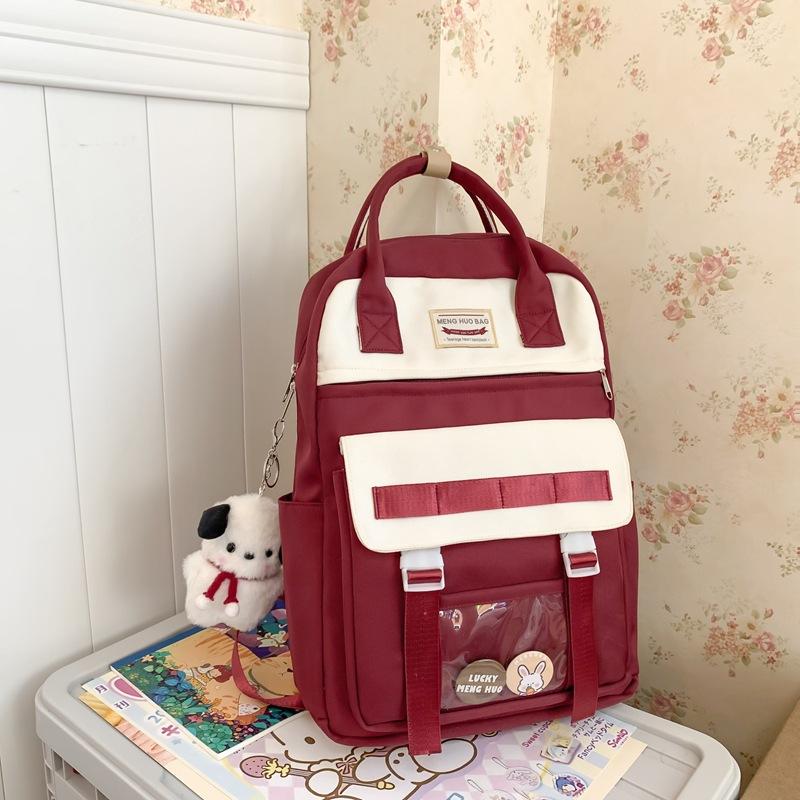 New high-value and lightweight schoolbag for junior high school students, college students, niche contrasting colors, portable backpack for women
