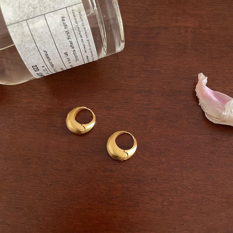 

Women s French-Style Best Selling Gold Hoop Sterling Silver Earrings Pair of gold brushed earrings