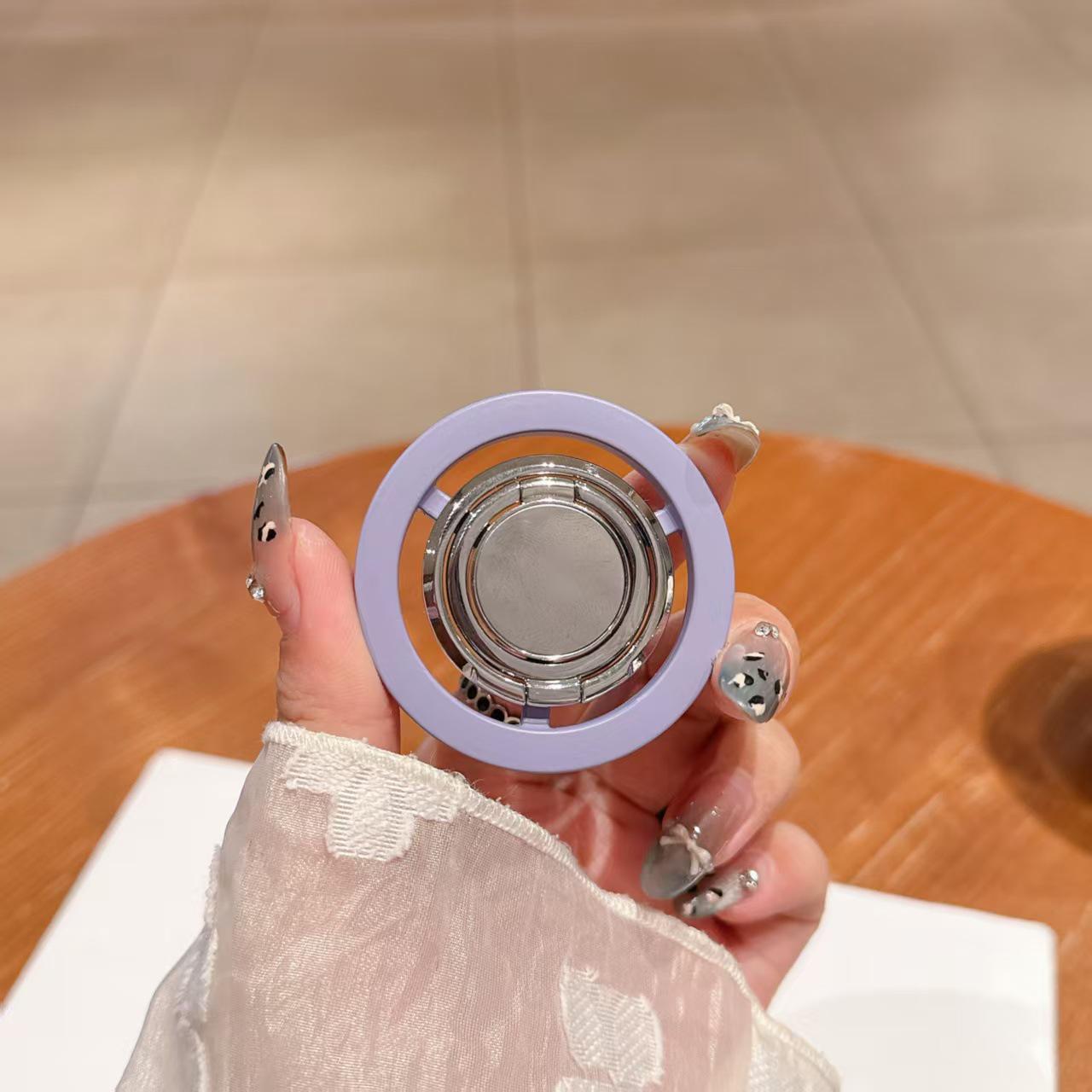 Universal Magnetic Alloy Phone Holder: Multi-functional Rotating Stand for Desktops