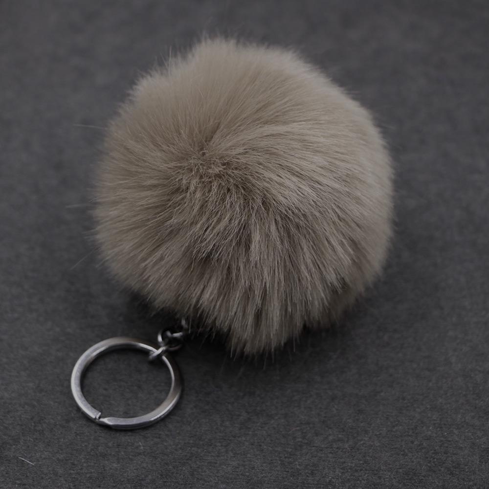

Милий помпон, барвистий пухнастий кульковий брелок, підроблений брелок з хутром кролика. Милі жіночі модні прикраси 11