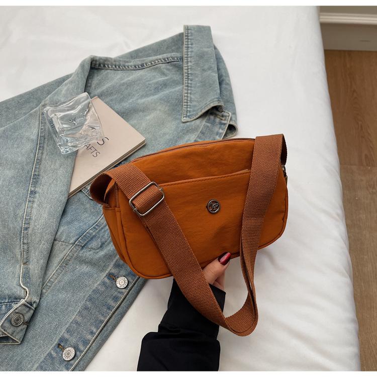 Casual new lightweight small square bag women's Korean version niche versatile solid color simple commuter student shopping messenger bag