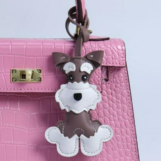 

Mini Schnauzer Puppy Leather Keychain: Cute Bag Charm & Creative Accessory червоний/фіолетовий