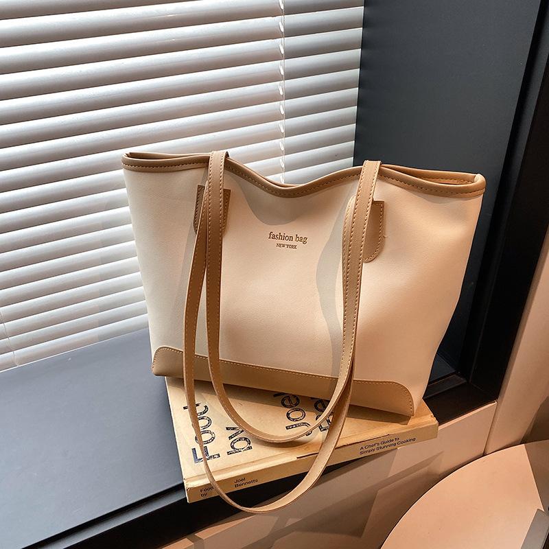 Simple and popular bucket bag women's bag new fashionable versatile commuter large-capacity tote shoulder bag