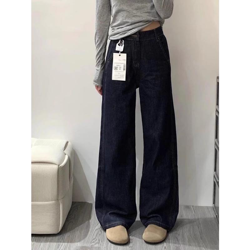 Jeans de damă mărime plus albastru închis cu picior larg, căptușiți cu fleece, cu talie înaltă și croială lejeră pentru toamna/iarna 2024.