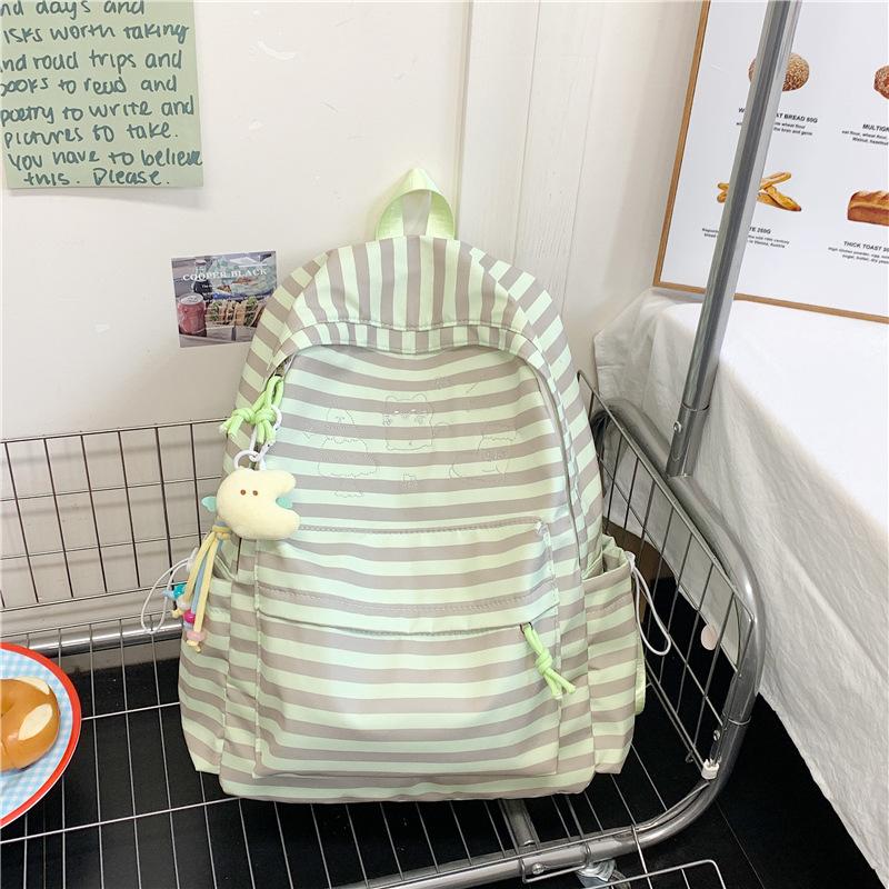 The New Schoolbag Is High-value, Fresh and Sweet, Striped Backpack, Lightweight and Large-capacity Backpack for Junior and High School Students.