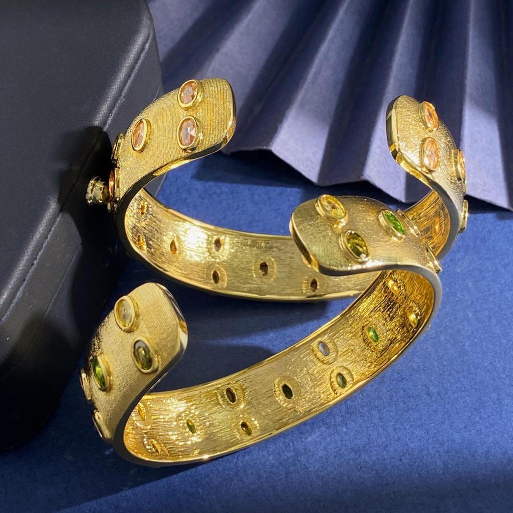 Brushed Gold-Plated C-Shaped Bracelet with Oval Gem