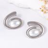 Fashionable and trendy alloy geometric spiral imitation pearl ear studs, retro, individual and exaggerated design sense earrings