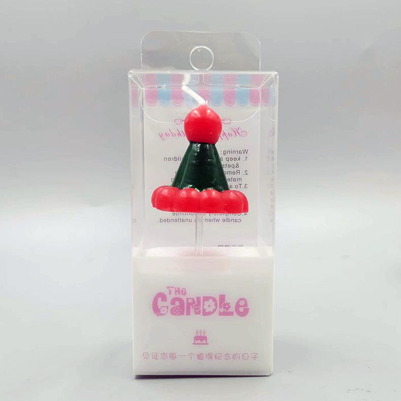 

Рождественская шляпа свеча атмосфера украшение свеча детское украшение для торта милая рождественская шляпа свеча креативность Green hat on red background