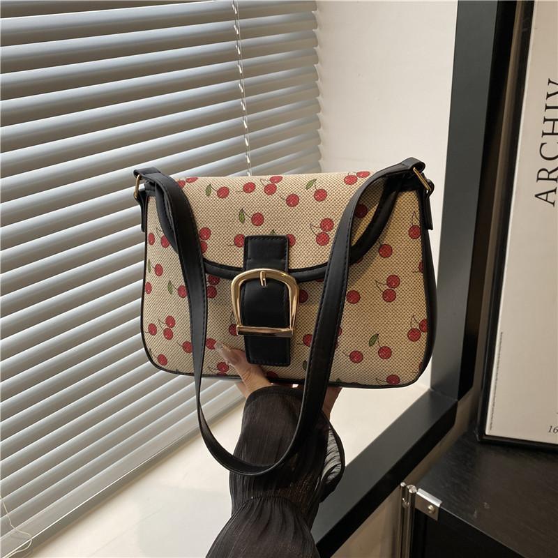 Fashion trend contrasting colors sweet large capacity shoulder armpit bag summer new handbag women's bag