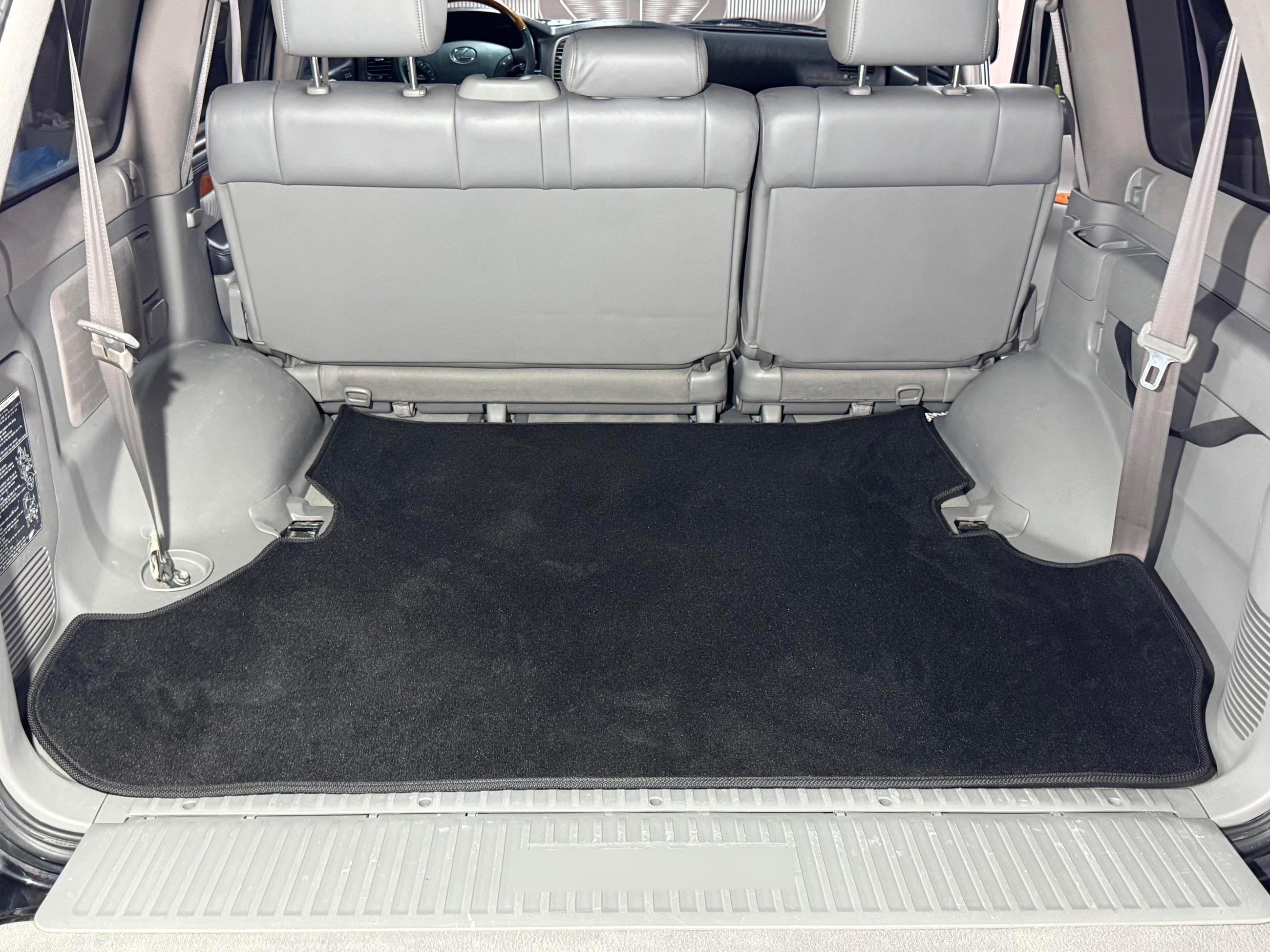 

Trunk mat textile Premium 2 pcs Black (7 places) for Toyota Land Cruiser 100