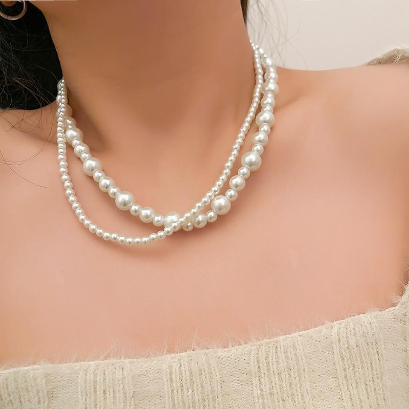 Fashion jewelry, bohemian multi-layer necklace, popular street auction popular pearl necklace.