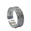 Handcrafted Sterling Ring With Cherry Blossom Motif Vintage Hammered Texture Adjustable Unisex Band