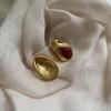 Niche Design Sense Light Luxury Court Style Golden Simple Water Drop Hollow Enamel Drop Glaze Stud Earrings Exquisite Versatile Earrings