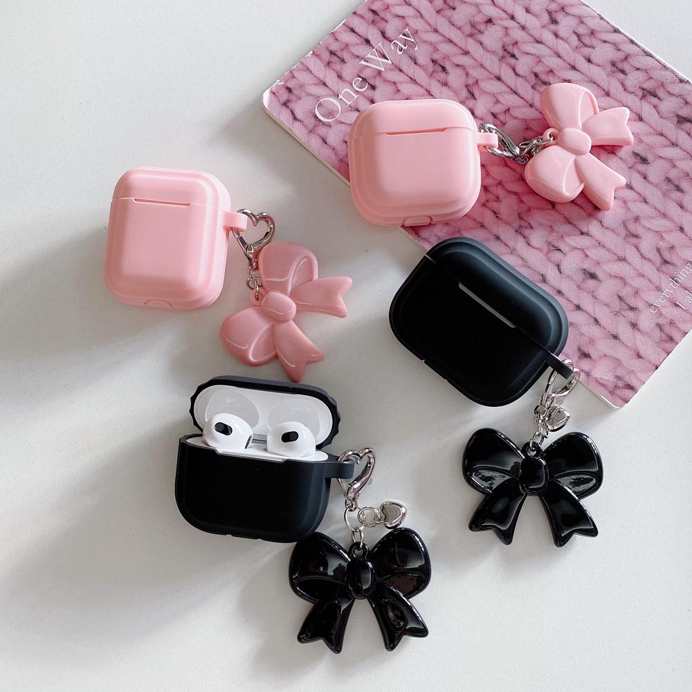 Schutzhülle aus weichem Silikon mit Schleifenanhänger für AirPods 1, 2, 3 und 4 sowie Apple AirPods Pro 2 – ein ideales Geschenk für Frauen und Mädchen.