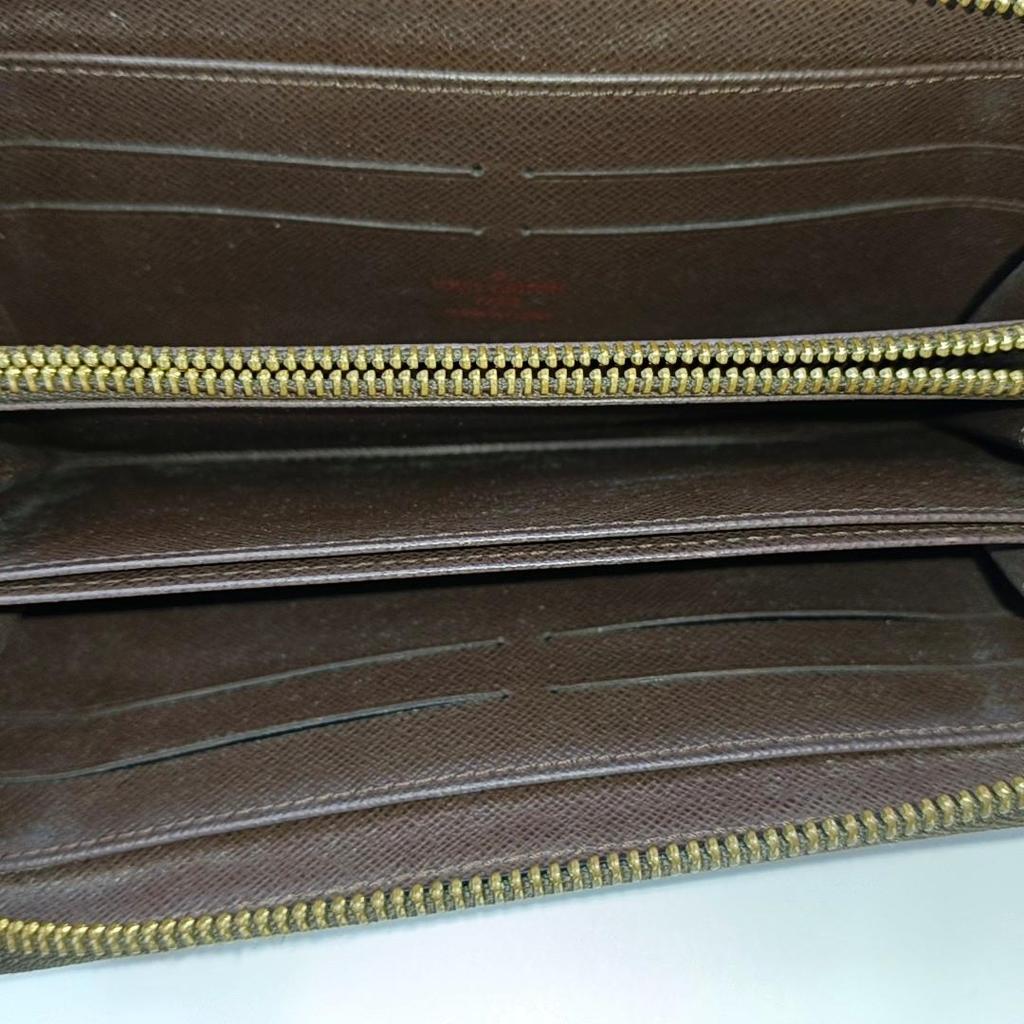 [Pre-Owned] Zippy Checkered Coated Canvas Wallet - Very Good #1FML7OS