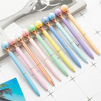 1 pieza Bolígrafo giratorio de metal con forma de perla de color caramelo INS, material de oficina para la escuela, regalo de papelería