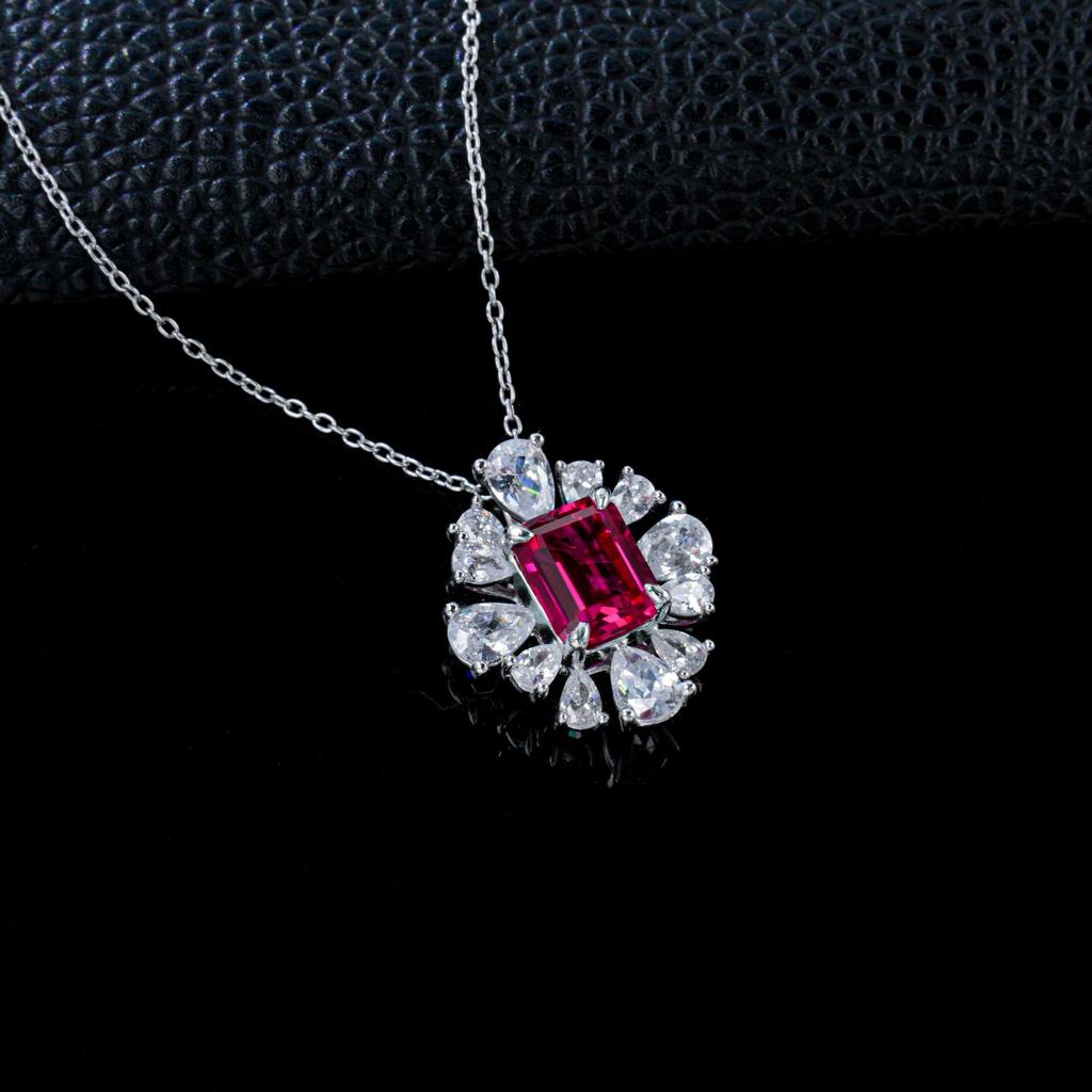 Elegant Flower-Embellished S925 Silver Pendant with Pigeon Blood Red Stone and Water Drop Accents - Perfect for Evening Parties and Gifts.