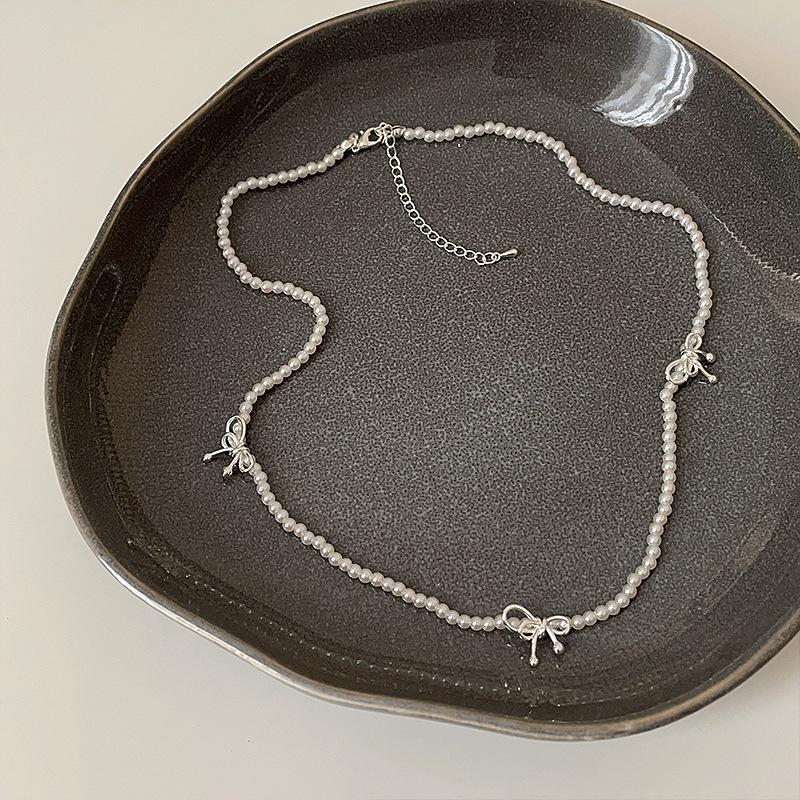 

Простое высококачественное жемчужное ожерелье-бантик для женщин, французское ретро, легкое, роскошное, элегантное, модное, универсальное, цепочка на шею, цепочка на ключицу