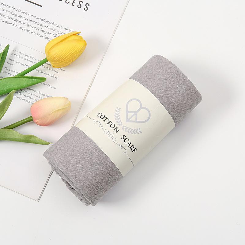 Autumn and winter new micro-elastic crumpled cotton blended long towel right angle lock edge polyester headscarf hot-selling solid color scarf