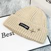 Autumn and winter letter hat women's fashion wool hat warm versatile sweet cool air cold hat show face small knitted hat tide