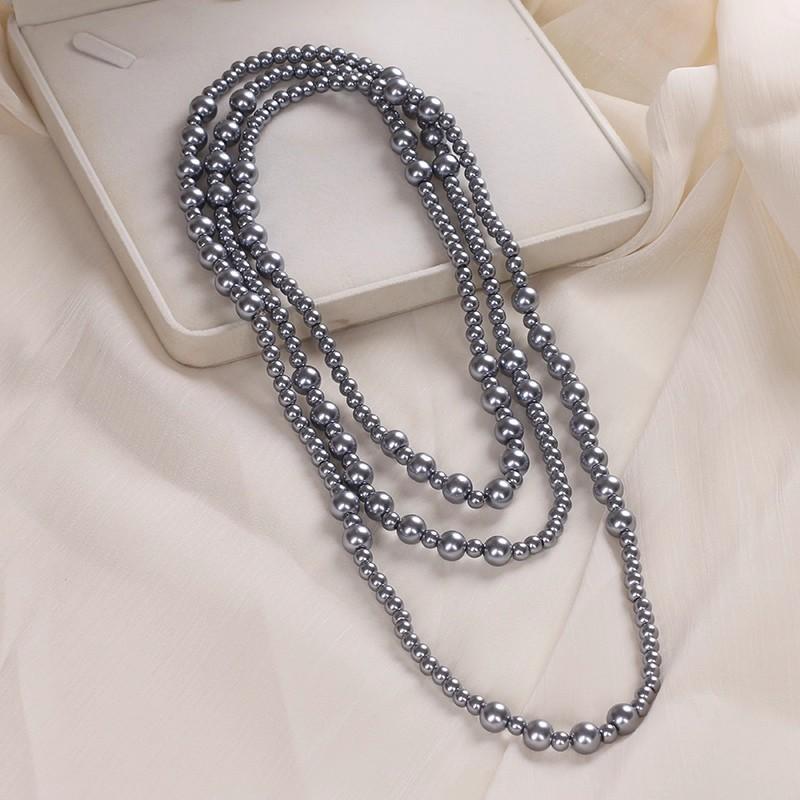 Hepburn style long stacked pearl necklace women's sweater chain temperament advanced sense light luxury niche 2025 new explosion
