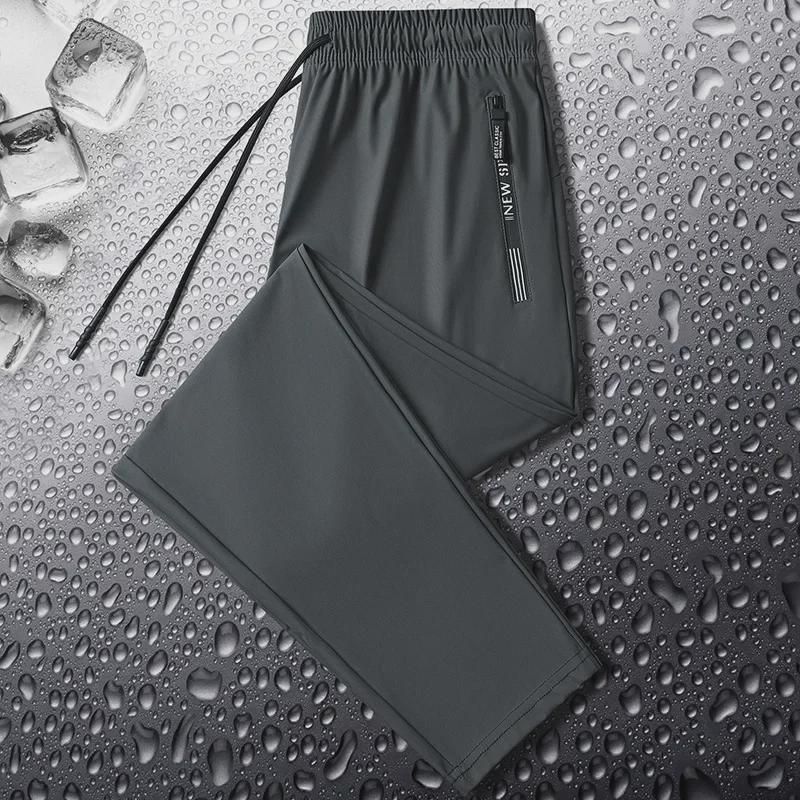 Men's Large Ice Silk Quick-Dry Pants: Cool, Thin Summer Trousers for Construction Workers and Farmers.