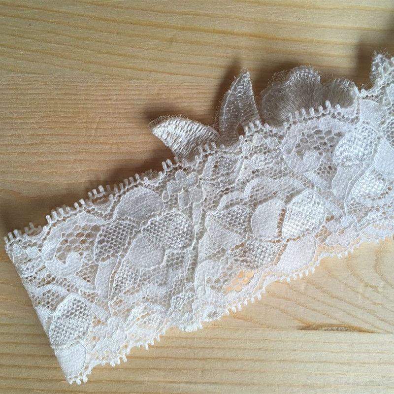 Luxuriöses Spitzen-Brautstrumpfband Something Blue Perle, Blume Perlen Hochzeit Braut