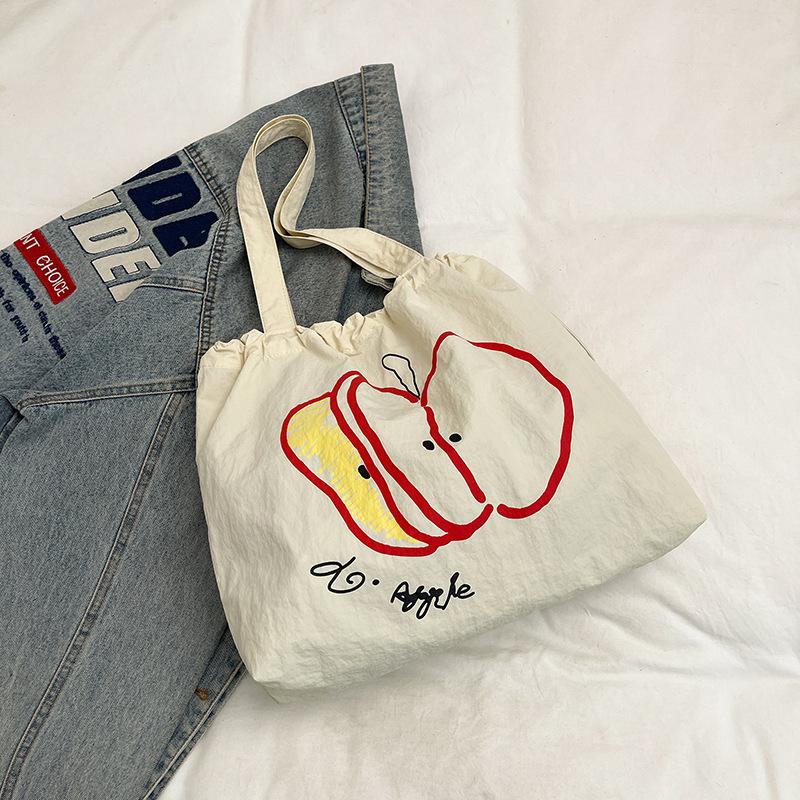 2025 Summer New Drawstring Canvas Bag Student Light Commute Versatile Shoulder Bag Niche Large Capacity Simple