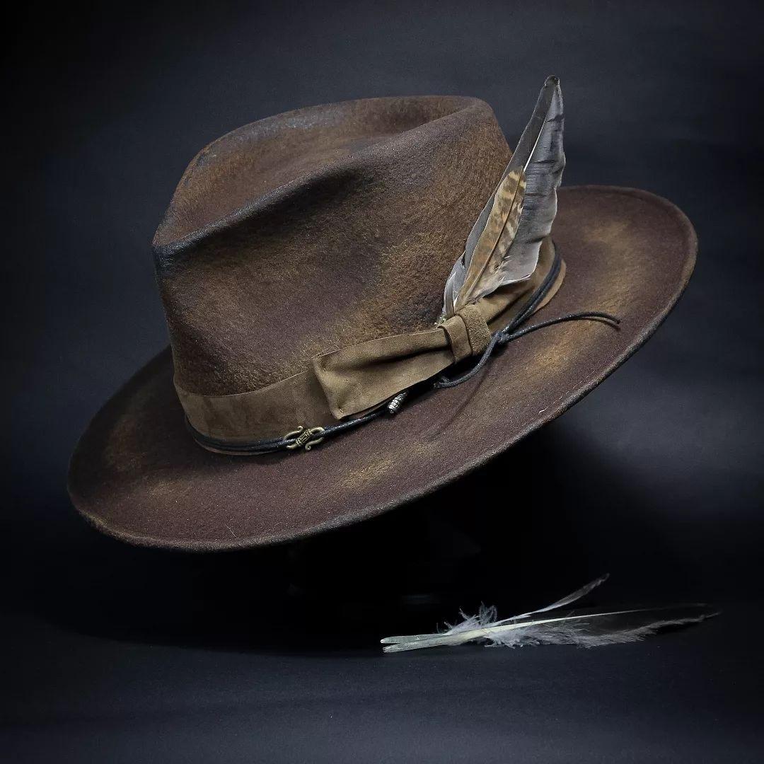 Old retro sheep felt hat feather