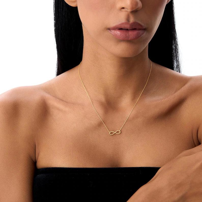 Women Gold Infinity Pendant Necklace Creative Twisted Wire Design Symbolizing Sacred And Lasting Love