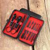 24-Piece Black & Red Manicure Set: Nail Clippers, Tweezers, Ear Pick, Scissors