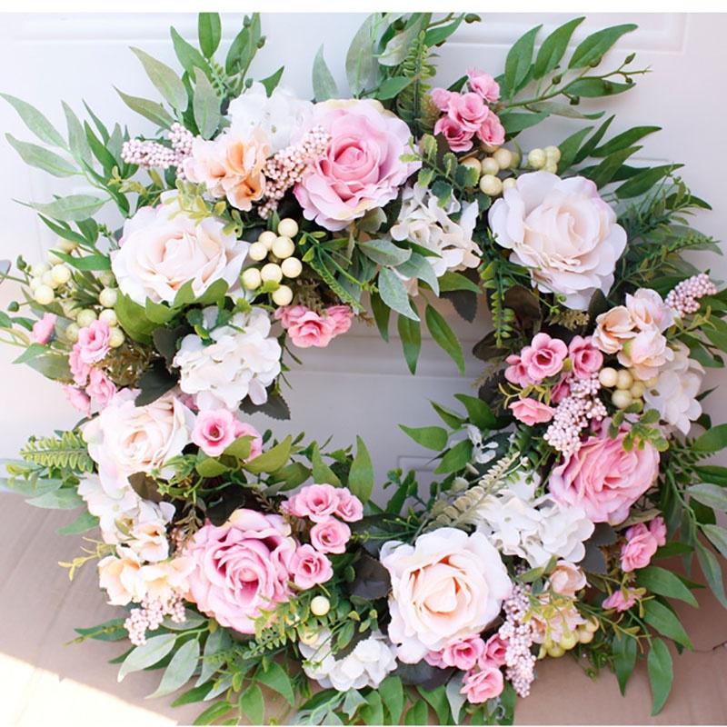 

Декоративный венок из искусственных цветов белый