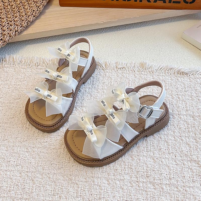 

Girls Mesh Bow Princess Sandals2026New Summer Solid Color Open-Toe Sandals for Older Children Beach Shoes 26-30Code one hand5Double бежевый