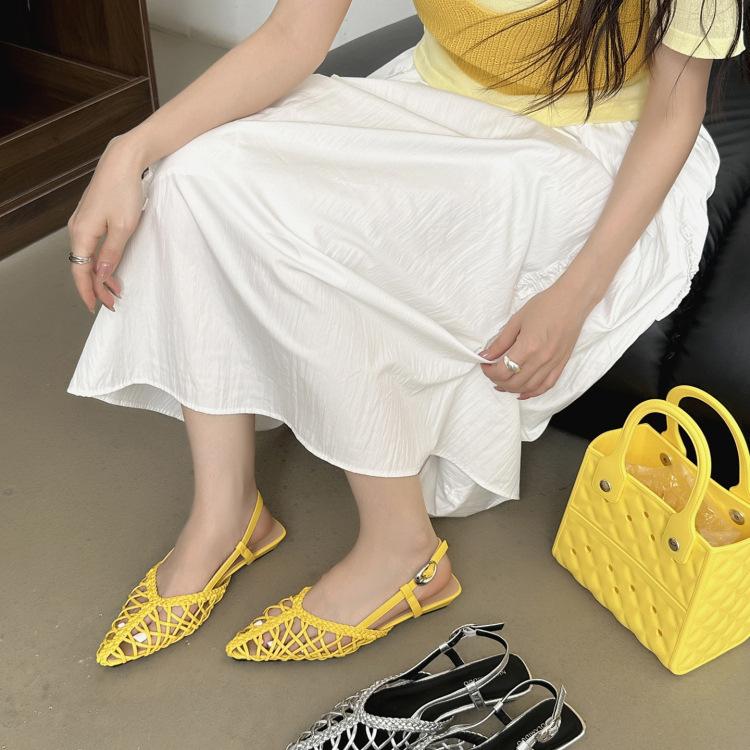 Korean Version of Niche Woven Breathable Sandals Women's 2025 New Holiday Style Flat Bottom Pointed Hollow Muller Sandals Outside Wear