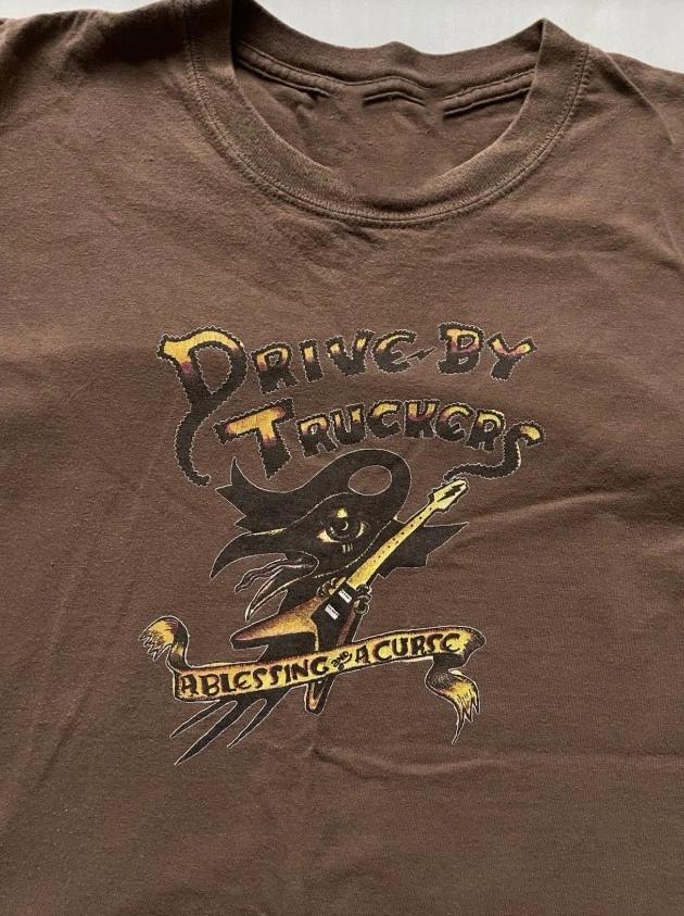 

Drive-By Truckers A Blessing And A Curse Dark Chocolate T-shirt MC1225 2XL