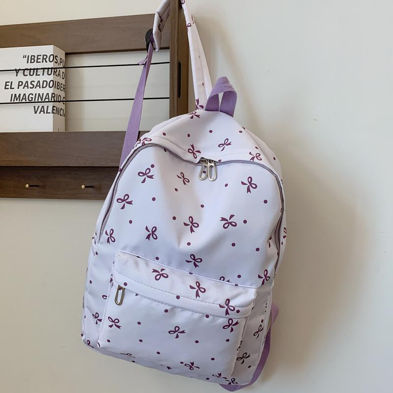 Back To School Backpack Playful Bow Print Bookbag Quilted Comfort and Multi-Pocket Organization System for Women's Campus Life