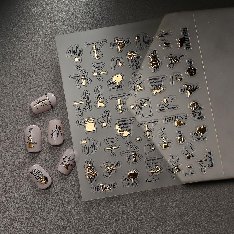 

Wangyuan Gilding Nail Sticker Minimalist Lines Fancy Asymmetrical English Letters Adhesive Nail Patch Transparent CO-260