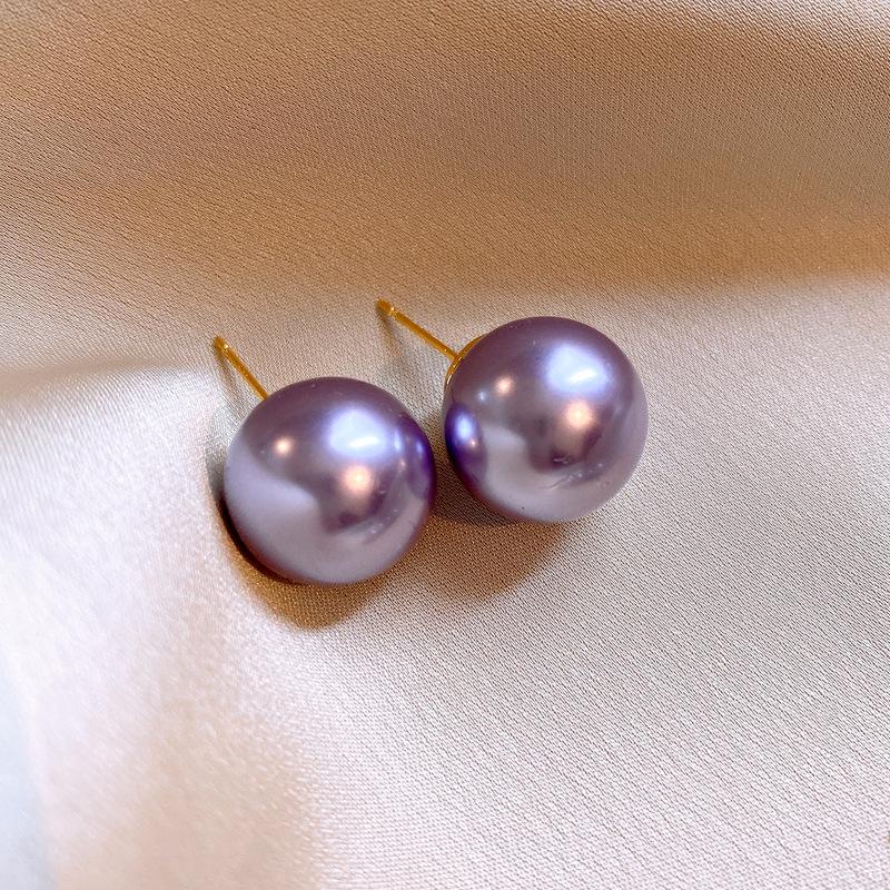 

Пурпурные серьги-пусеты с жемчугом и стразами