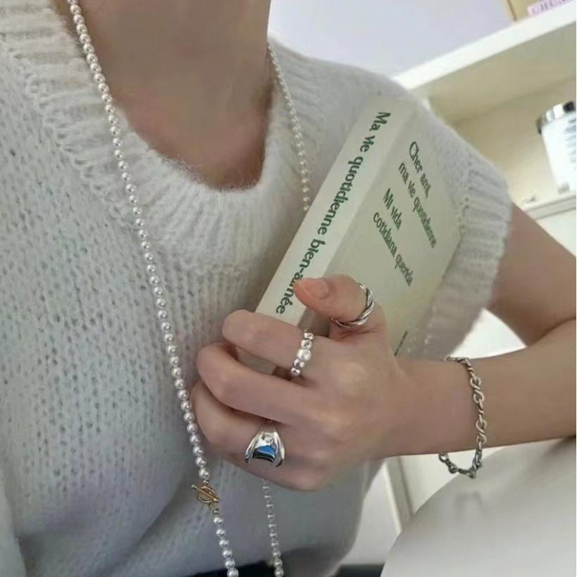 French-style double-layered long pearl necklace baby Pearl necklace, a delicate and stylish chain for sweaters and necks, designed for women