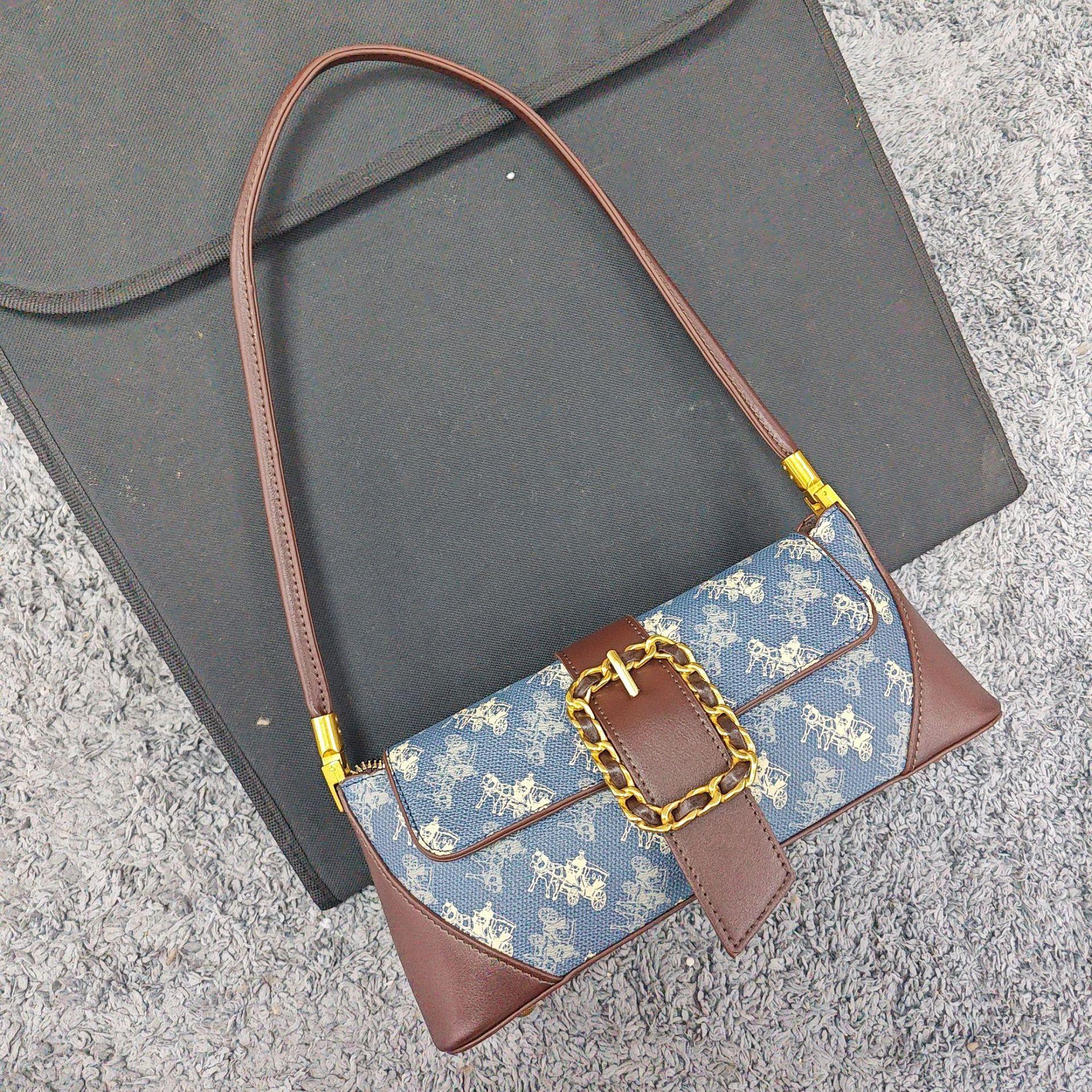 Bag Versatile Premium Sense Retro Baguette Bag Women S Niche Versatile Single Shoulder Armpit Bag Tide 27*8*12 CM синий