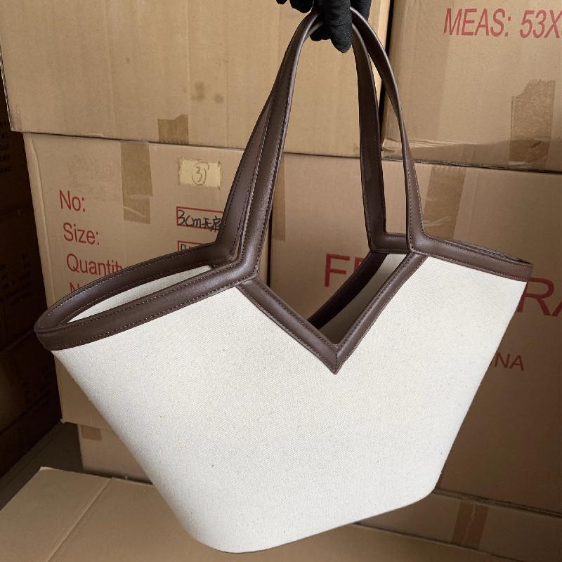2026 Fashi Versatile PU Canvas Bucket Shoulder and Crossbody Bags Simple Casual Sense of Luxury Retro Handbags for Women
