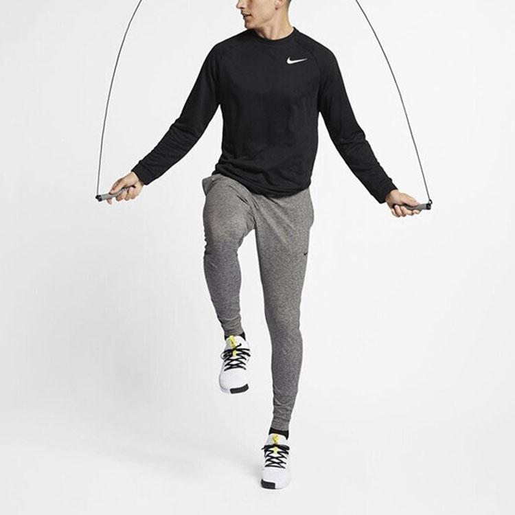 Nike Spodnie dresowe joggery z logo w jednolitym kolorze Męskie doły Szare AT5697-032