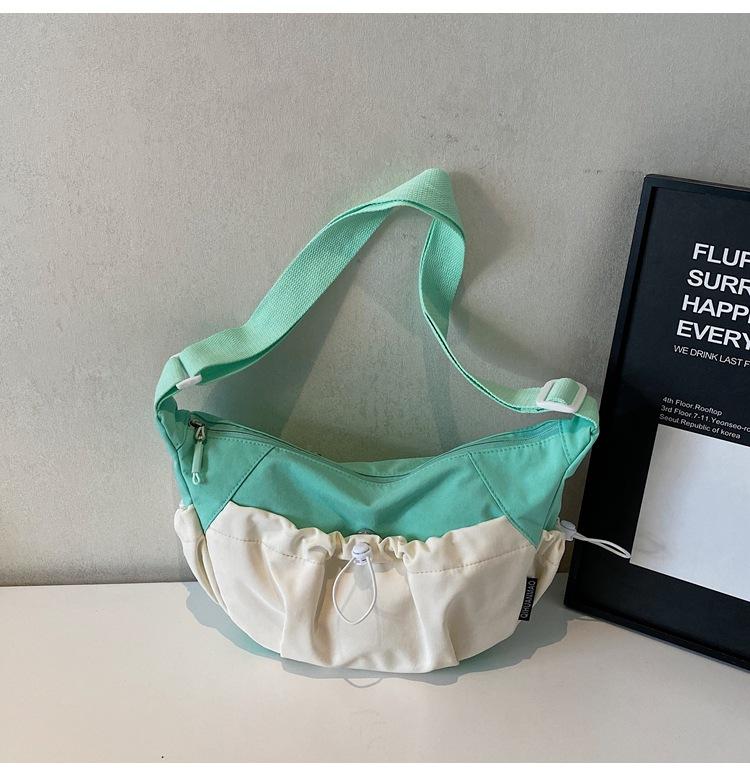 

Нейлоновая тканевая сумка женская большая вместимость сумка через плечо 2025 новая плиссированная сумка-ведро высококлассная текстура сумка-тоут для поездок на работу бирюзовый