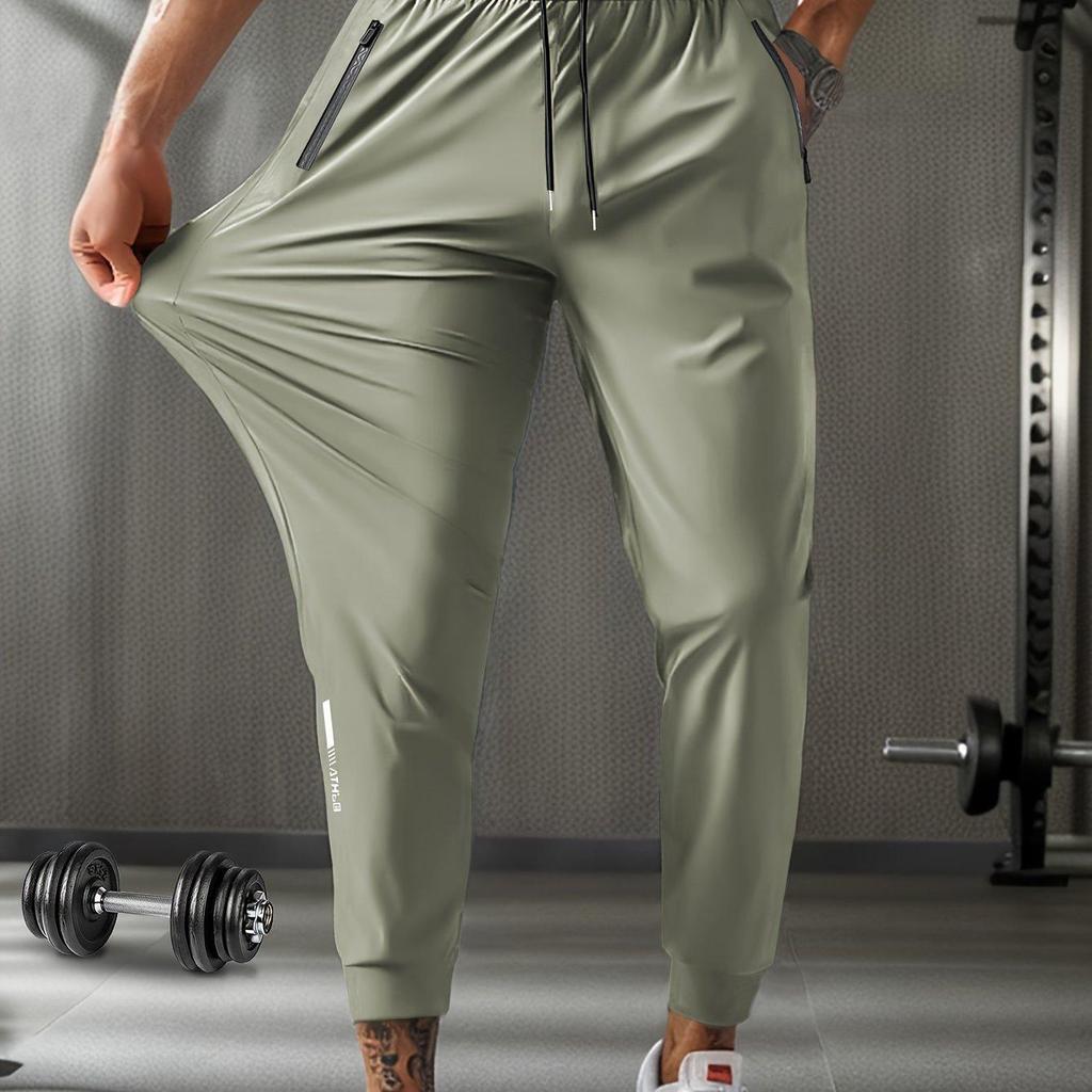 Oddychające Spodnie Dresowe Męskie Plus Size Casualowe dla Mężczyzn Spodnie do Treningu Szybkoschnące Proste Elastyczny Pas Koreański Klasyczny Sportowe