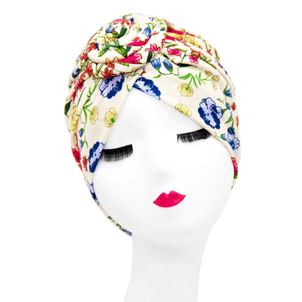 Stylish Donut Turban Hat: European & American Ethnic Swirl Design