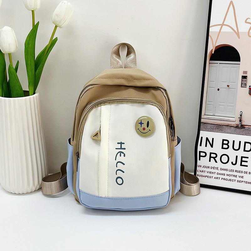 

New primary school students backpack women s new large-capacity first and second grade schoolbag simple and fashionable contrasting color backpack one size fits all