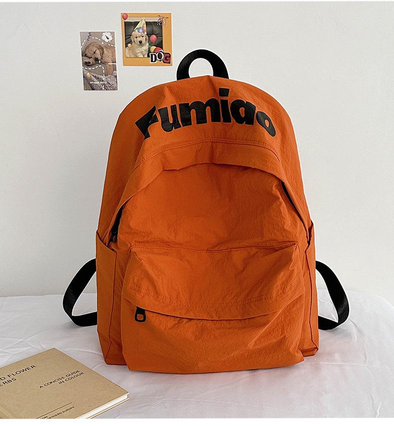 Lightweight Minimalist Backpack for Female Students: Versatile Double-Shoulder Bag for School and Travel.